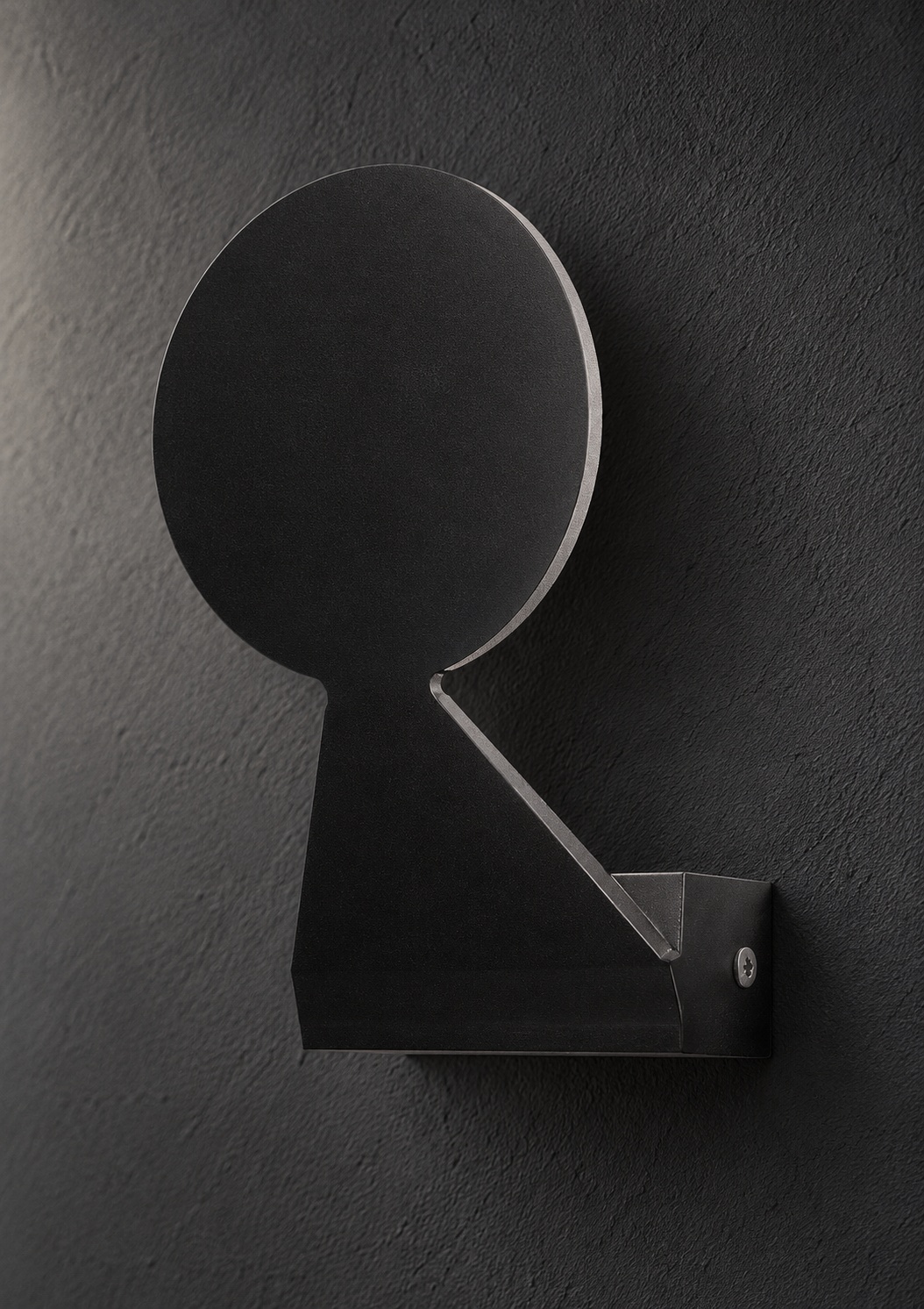 Applique  sculpturale noire à disque