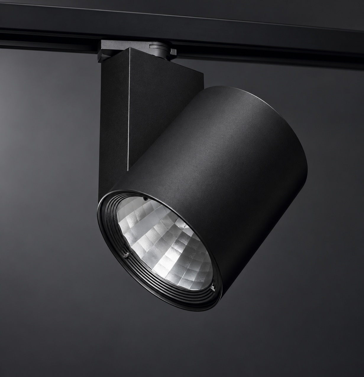 Spot cylindrique noir orientable sur rail